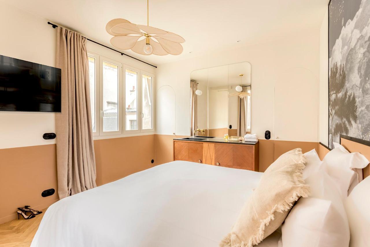 Habitat Parisien - Bourse Feydeau Apartment Bagian luar foto